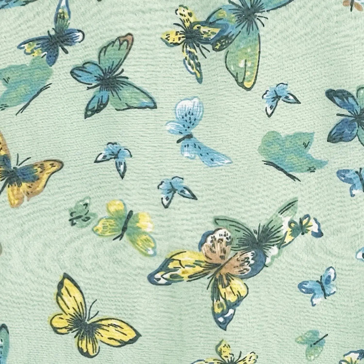 Butterfly print scarf on green background with butterflies