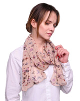 Butterfly print scarf: woman wearing floral pattern scarf