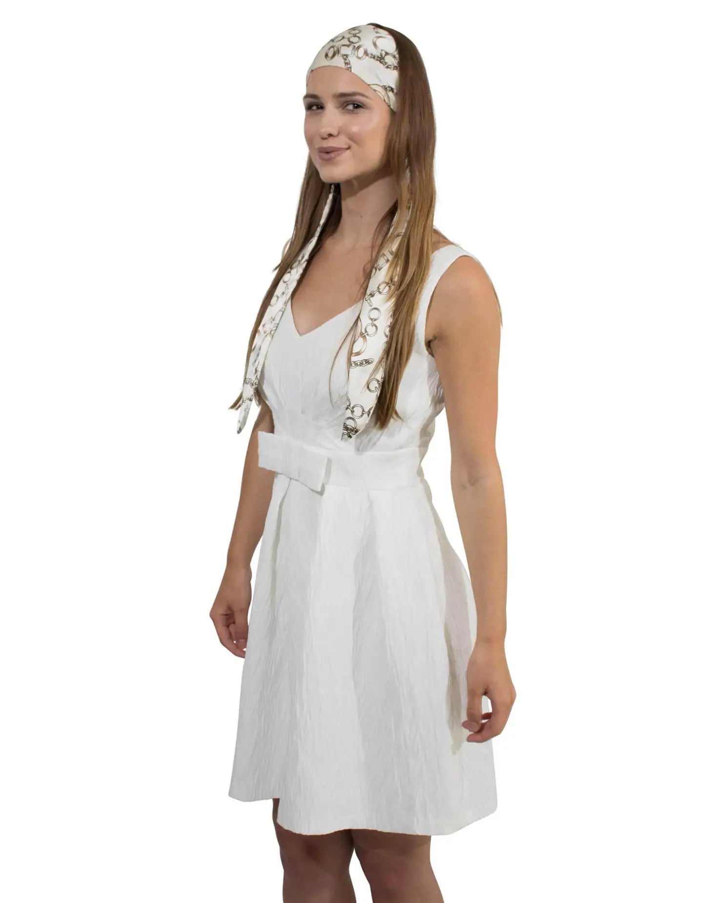 Woman in white dress with floral headband, wearing Chain Sailor Print Silky Satin Elastic Headband.
