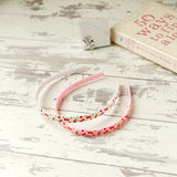 Cherry print Alice headbands in pink and red polka dot pattern