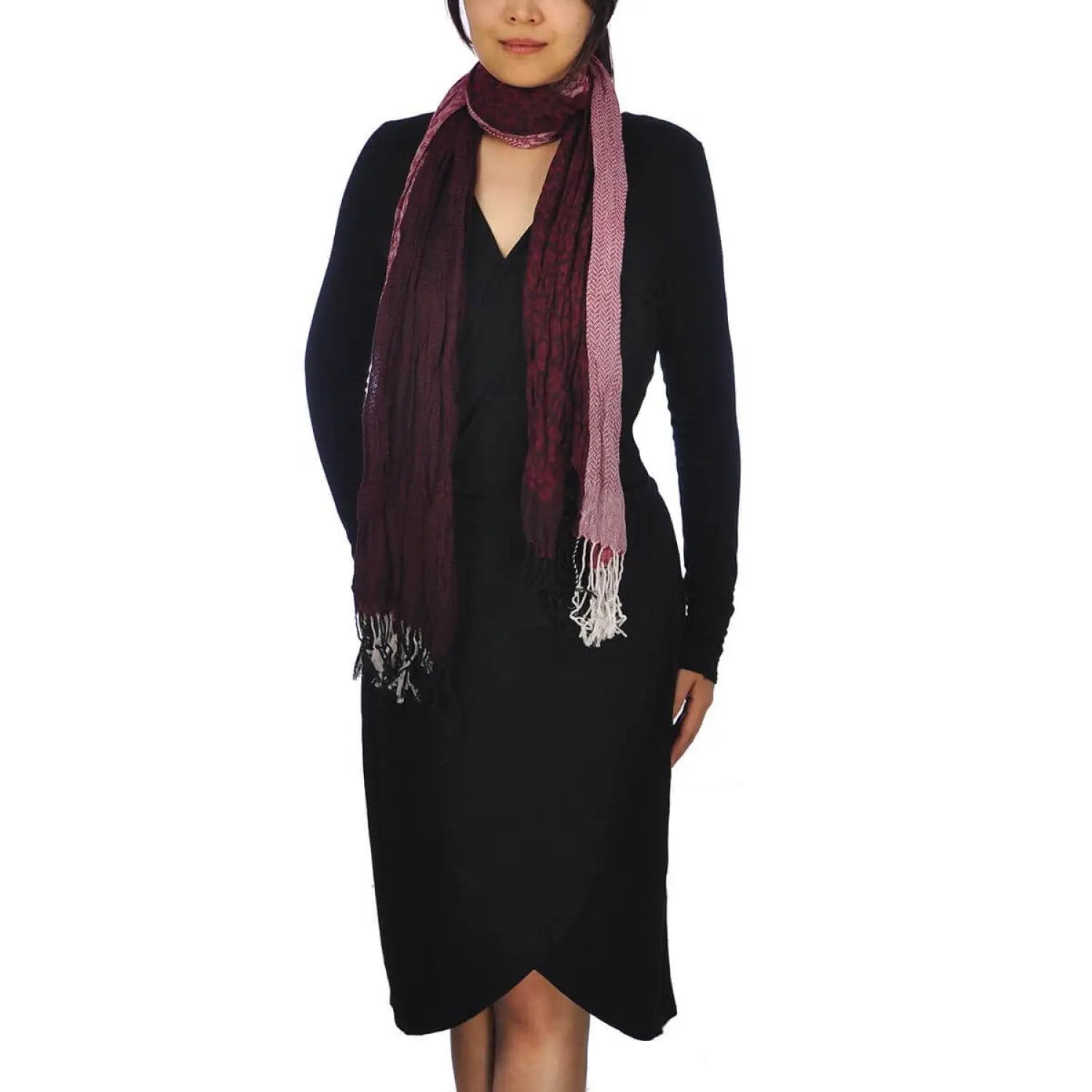 Woman in black dress and maroon scarf showcasing Chic Crinkled Stripes & Leopard Print Tasselled Scarf