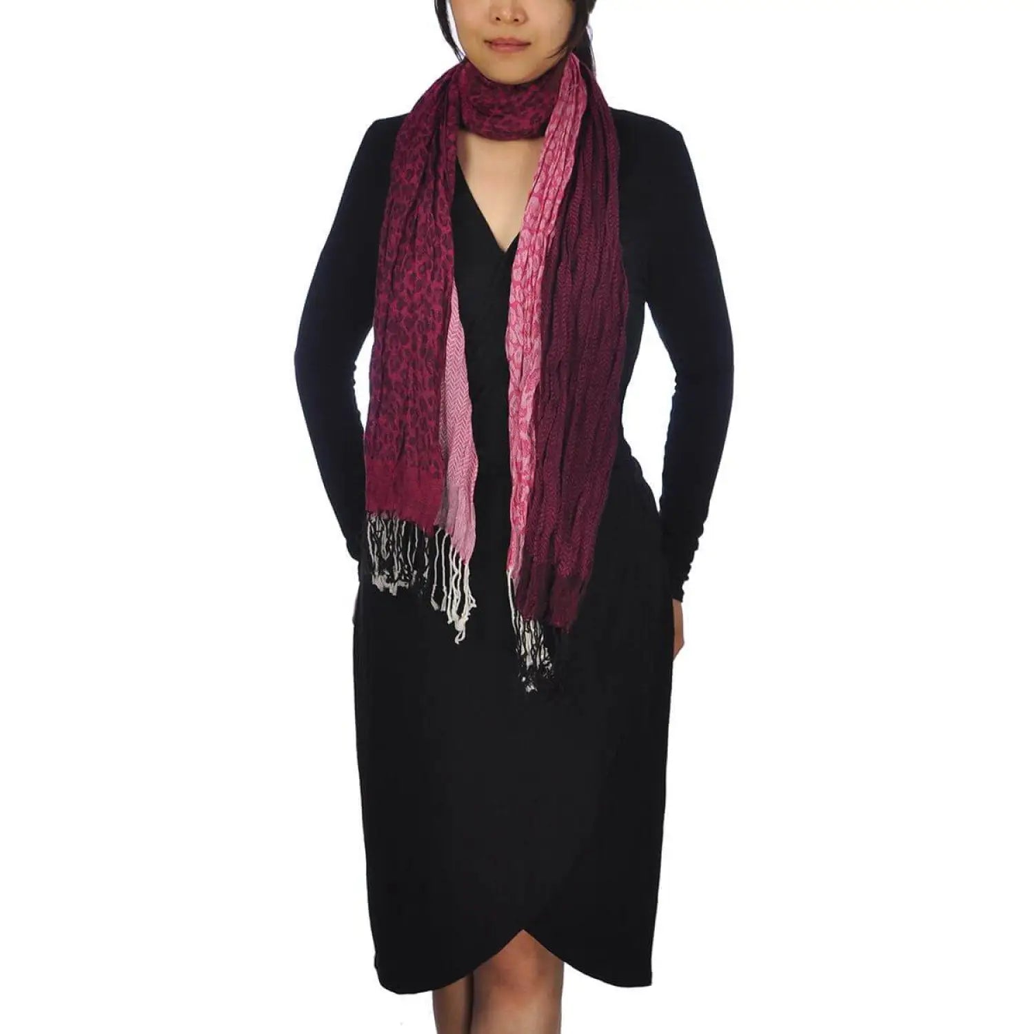 Woman in chic crinkled stripes & leopard print tassel scarf