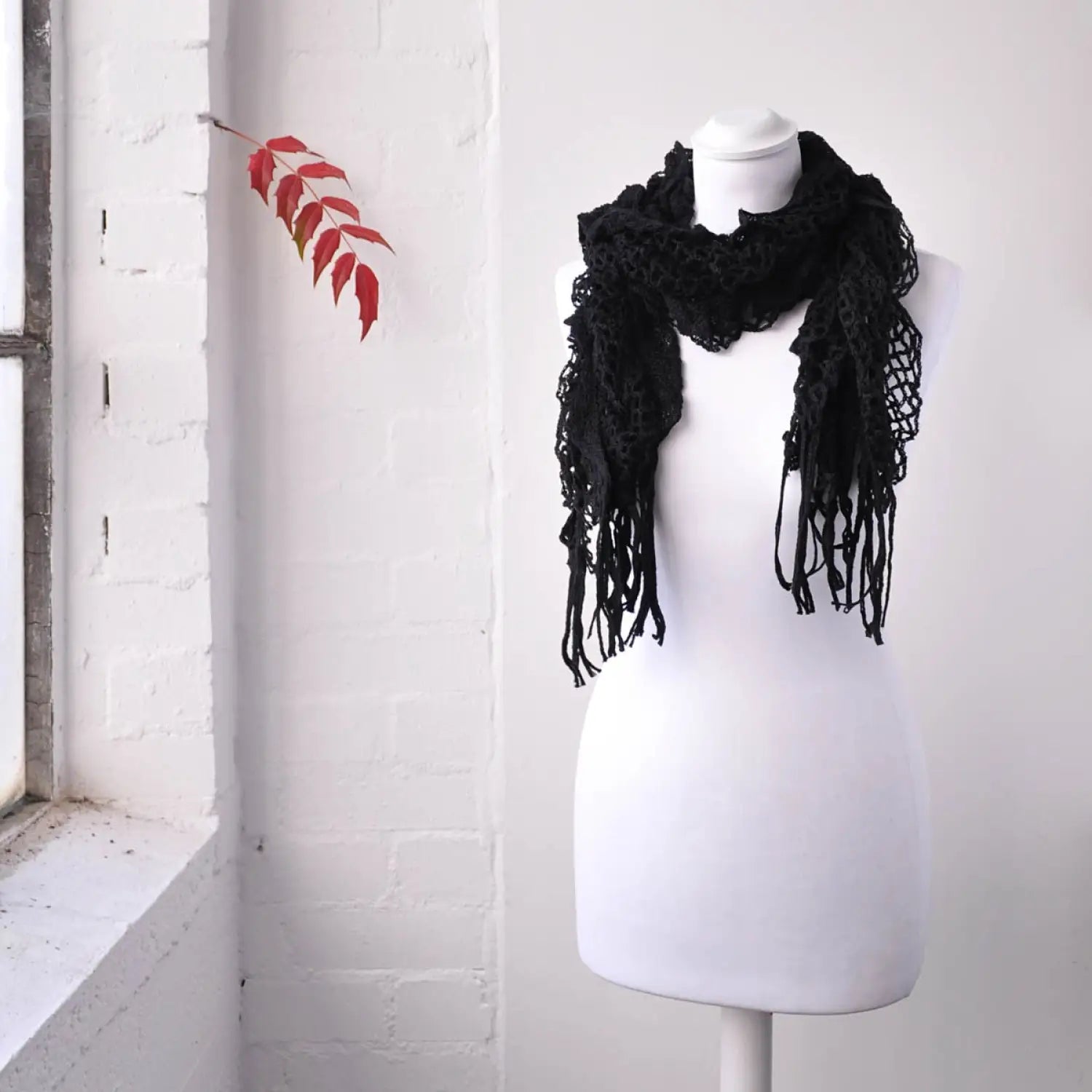 Chic Plain Knitted Ruffled Textured Scarf on mannequin