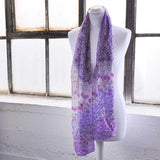 Chiffon floral print scarf on mannequin with window background