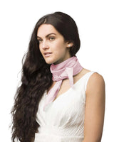 Woman with long hair wearing pink bow in Chiffon Square Scarf for Women.