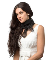 Woman wearing black bow tie chiffon square scarf for women.