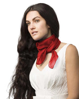 Woman wearing a red chiffon square scarf