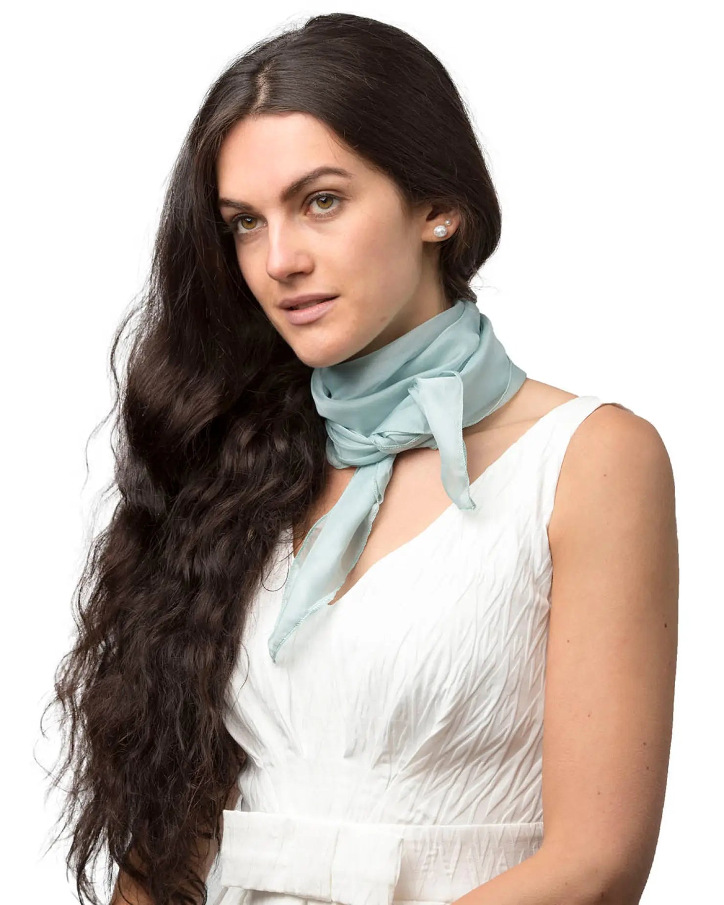 Woman in white dress and light blue scarf featured in Chiffon Square Scarf product.