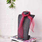 Grey man with pink ribbon wearing chiffon square scarf for 60s & 70s style