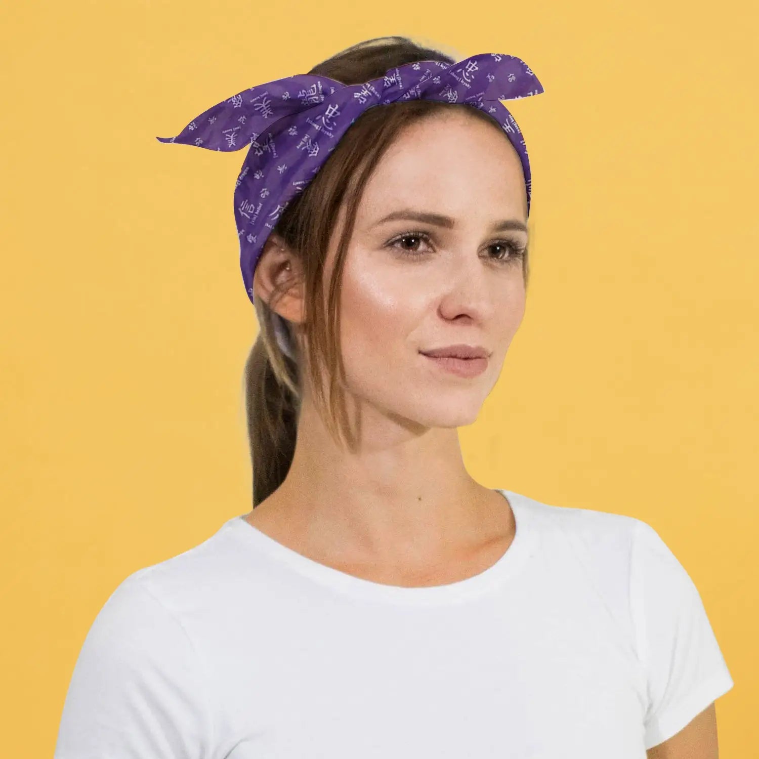 Stylish arafed woman wearing a purple Chinese character print bandana.