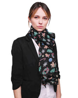 Woman wearing black scarf with Christmas tree print - Christmas Scarf Oversized Maxi Shawl.