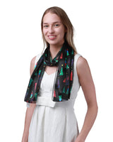 Girl wearing black and green scarf in Christmas Scarf Tree Satin Scarves for Men Women.