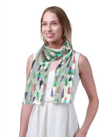 Woman in white dress and green scarf wearing Christmas Scarf Tree Satin Scarves for Men Women