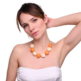 Woman wearing white dress and orange necklace from Chunky Beads Candy Colour Necklace.