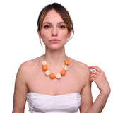 Woman in white dress holding Chunky Beads Candy Colour Necklace