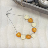 Yellow and white chunky beads bracelet displayed in Chunky Beads Candy Colour Necklace.