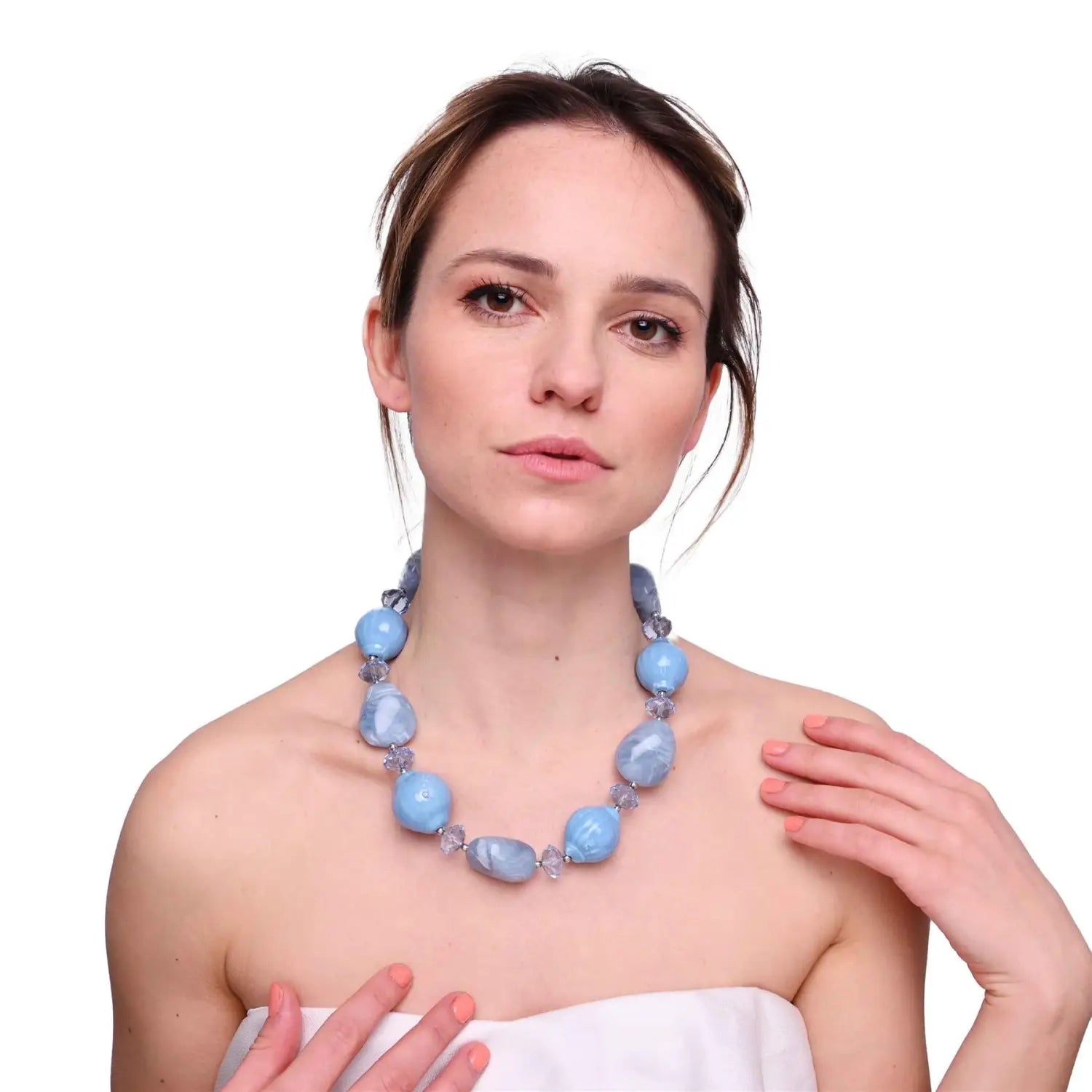 Woman in white dress wearing Chunky Beads Statement Necklace from Pastel Colour Collection.