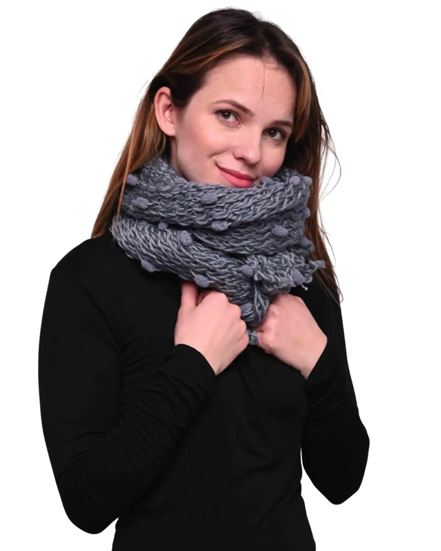 Chunky bobble knit scarf for winter with woman wearing gray scarf.