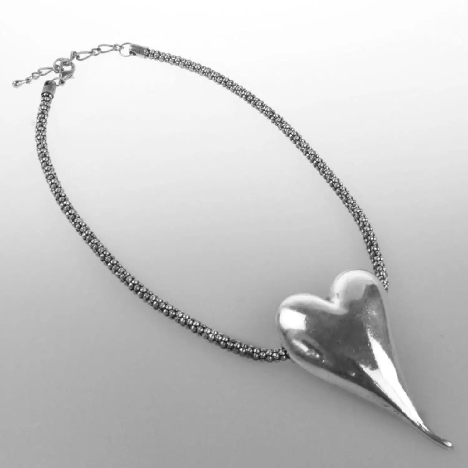 Silver heart bracelet with bead from Chunky Heart Pendant Necklace - Statement Accessory.