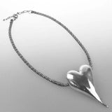 Silver heart bracelet with bead from Chunky Heart Pendant Necklace - Statement Accessory.