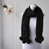 Chunky Knit Winter Scarf with Pom Pom Accents on Mannequin
