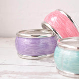 Chunky pastel hinged bangle with pink and blue marble glass jars