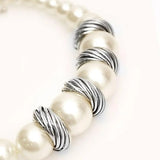 Chunky pearl bracelet with silver accents for bridal jewelry.