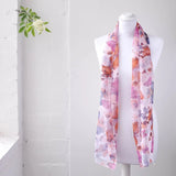 Colourful large butterfly print chiffon scarf displayed on mannequin.