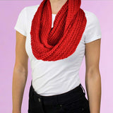 Woman wearing a red scarf in Cosy Chunky Knit Snood for Autumn & Winter.