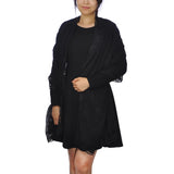 Elegant woman in black dress and jacket for Cotton Crinkled Lace-Edged Evening Scarf.