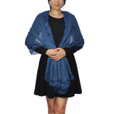 Woman wearing blue cotton crinkled lace-edged evening scarf