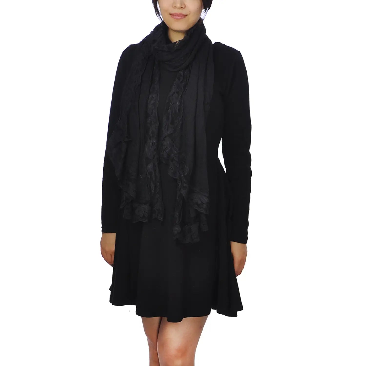 Woman wearing black cotton crinkled lace evening scarf.