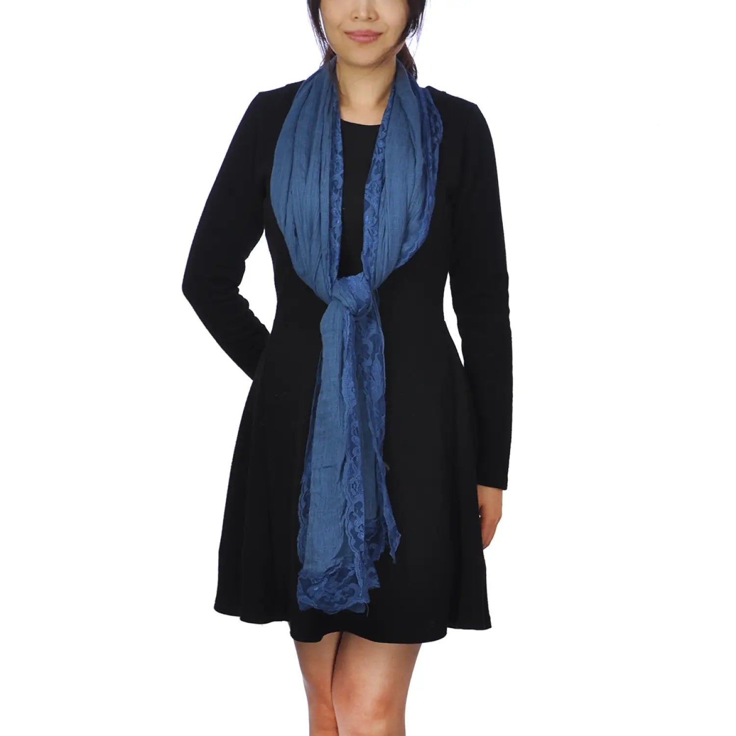 Woman wearing blue cotton crinkled lace-edged evening scarf.