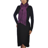 Woman wearing a purple crinkled cotton scarf