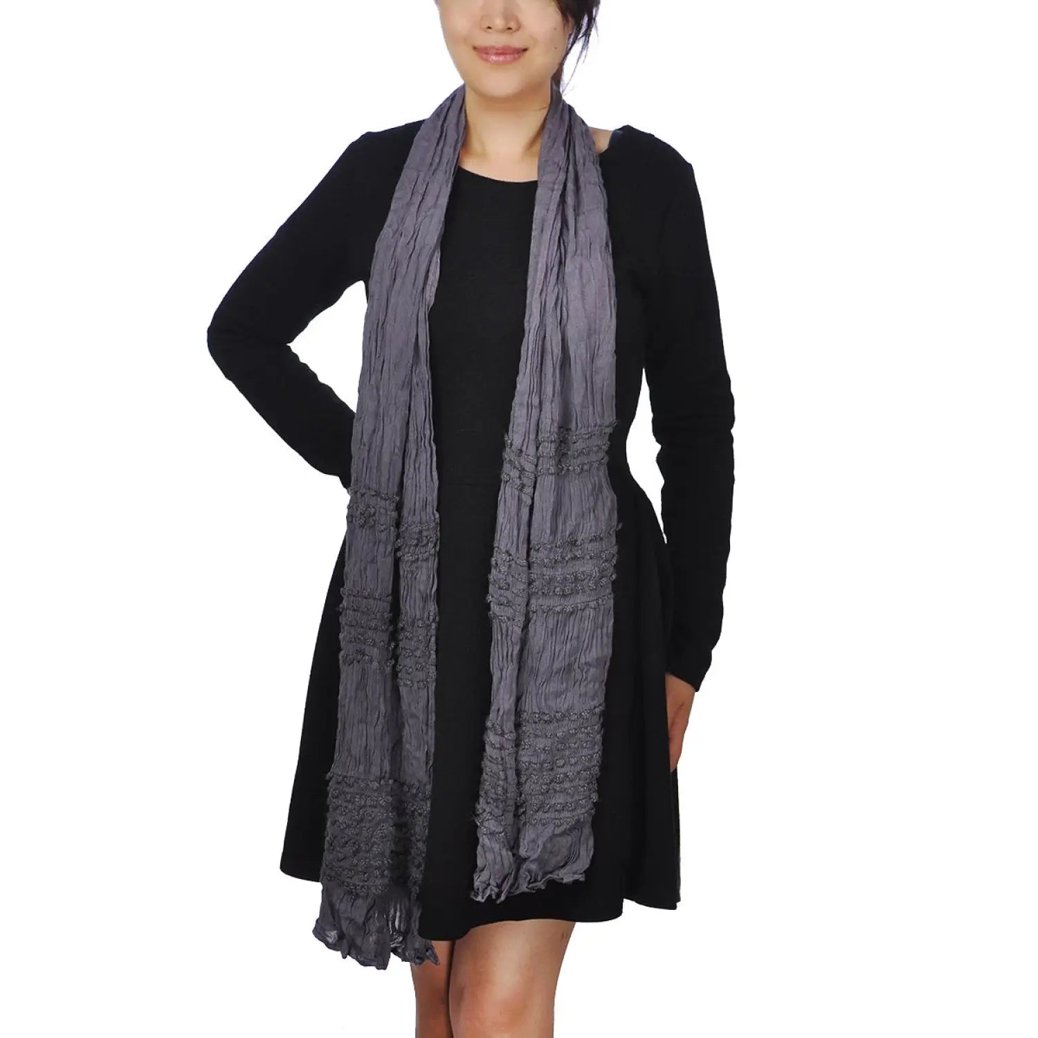 Crinkled embroidered warm scarf with black and grey design.