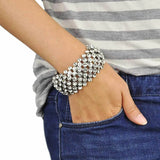Woman wearing silver bead bracelet with diamante rhinestone crystals