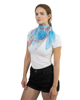 Woman wearing elegant blue floral print chiffon scarf with rose design and detachable 3D flower pin