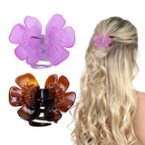 Woman with long blonde hair wearing Elegant French Butterfly & Flower Hair Claws.