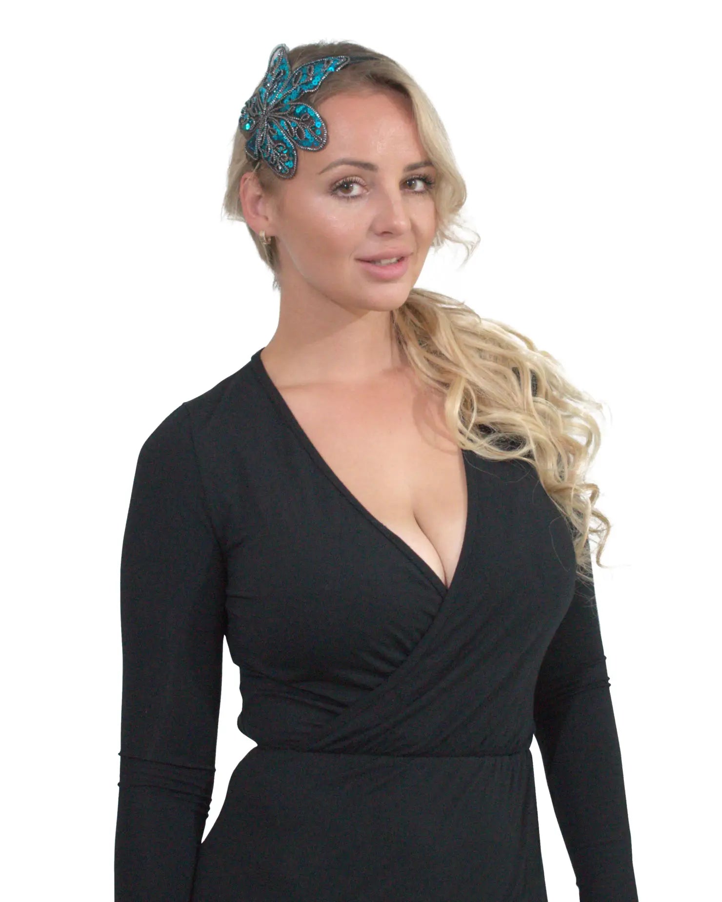 Woman wearing black dress with blue butterfly on Elegant Leaf Alice Headband.