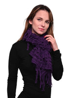 Woman wearing elegant plain knitted purple scarf.
