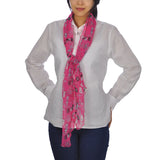 Woman in pink silk blend sailor anchor scarf & white shirt.