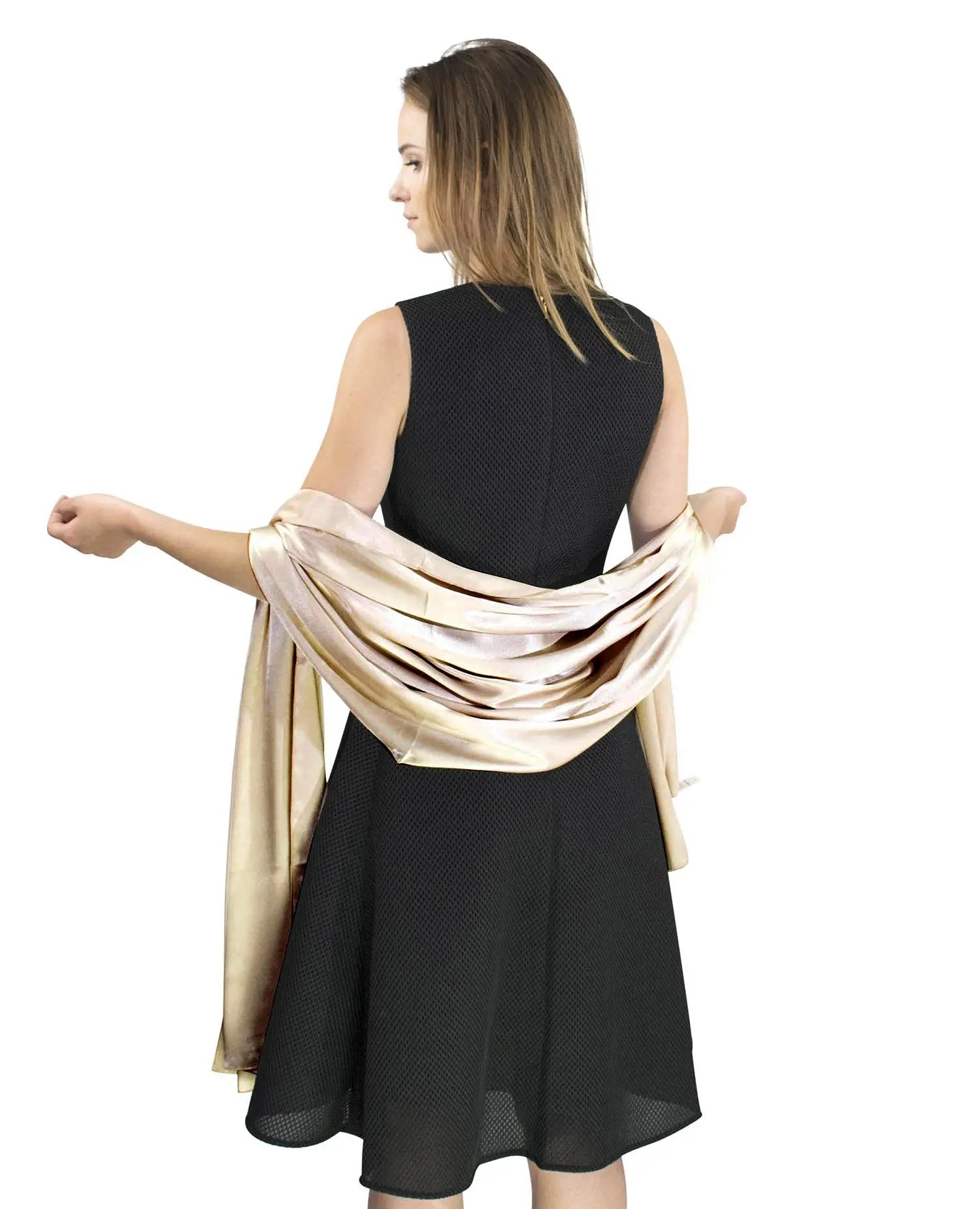 Woman in elegant satin evening shawl with black dress and beige scarf