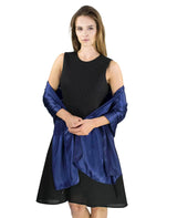 Elegant satin evening shawl in black dress with blue top