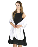 Elegant satin evening shawl on woman in white shirt and black skirt.