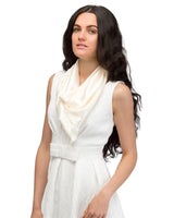 Woman wearing Elegant Solid Satin Large Square Scarf in white dress and white scarf.
