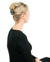 Woman wearing Essential Hair Claw Clips set, with ponytail hairstyle.