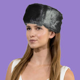 Black faux fur ear warmer headband worn by woman