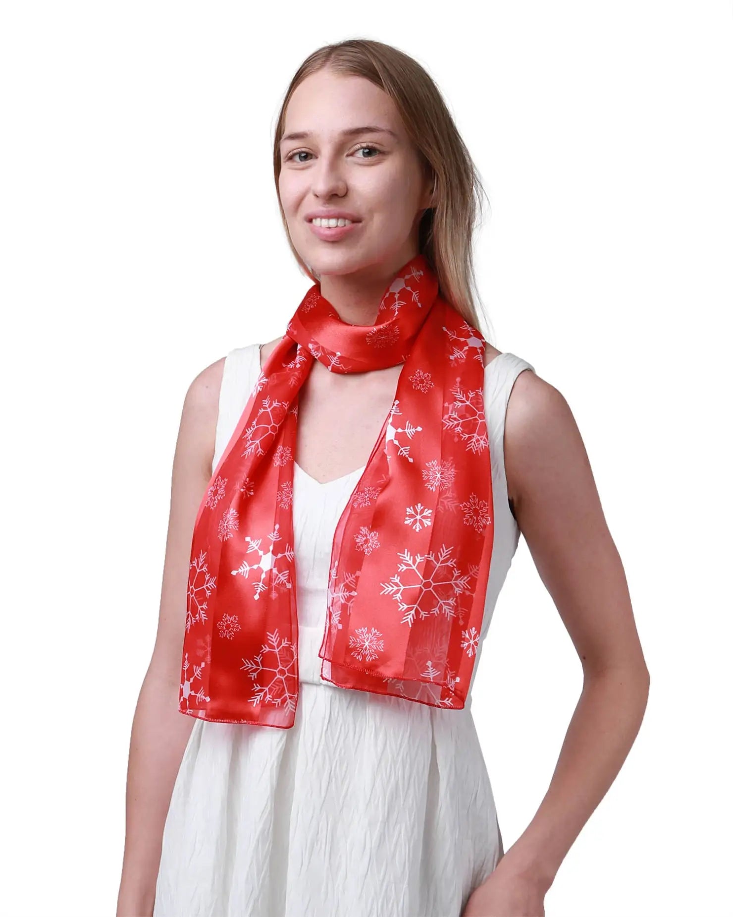 Woman wearing festive snowflake satin stripe Christmas scarf.