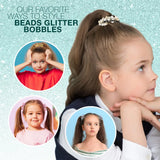 Little girl with ponytail wearing beaded metallic elastic bobbles