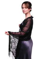Woman in stylish black lace tassel shawl